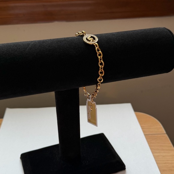 Michael Kors Gold-Tone Chain Bracelet with Logo Charms - Picture 12 of 15